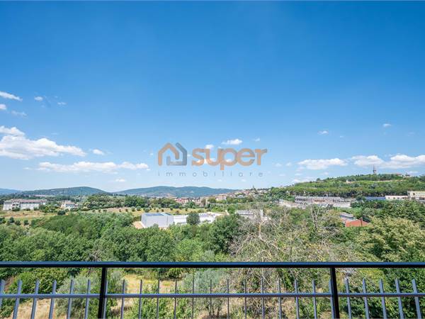 APPARTAMENTO CON TERRENO E VISTA PANORAMICA 